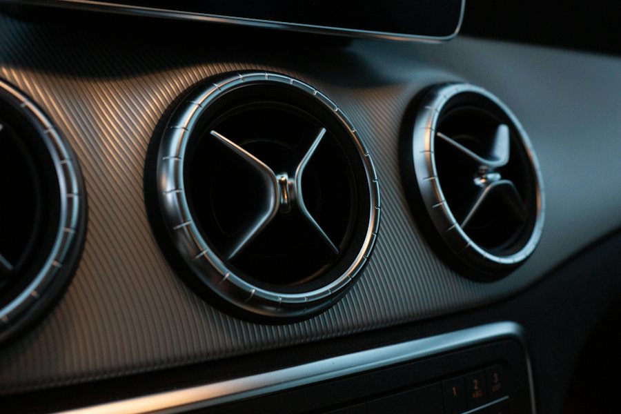 Round air vents on a car dashboard